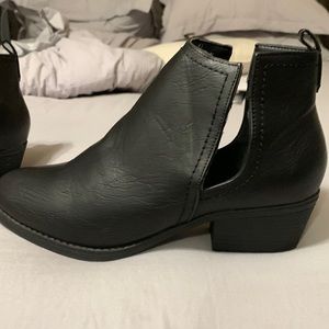 Black booties with cut out detail